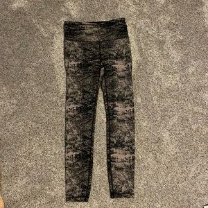 Athleta Elation Glades tights in size small; Black and Tan